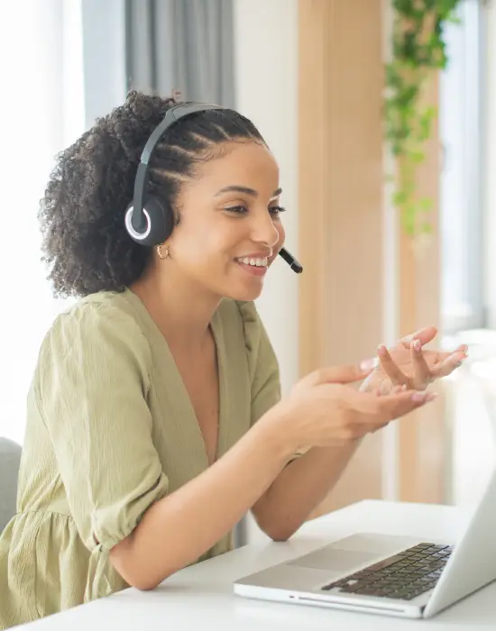 A woman taking a call from a customer
